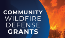 USDA & USFS Logos, on a image of a wildfire, with the text "Community Wildfire Defense Grants" 